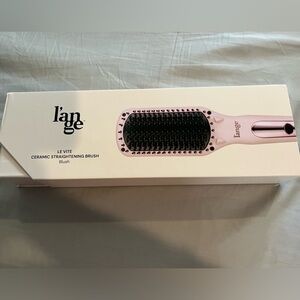 Brand new hair straightening brush
